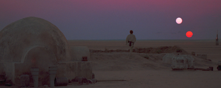 Luke Skywalker staring off at the twin sunset on planet Tatooine